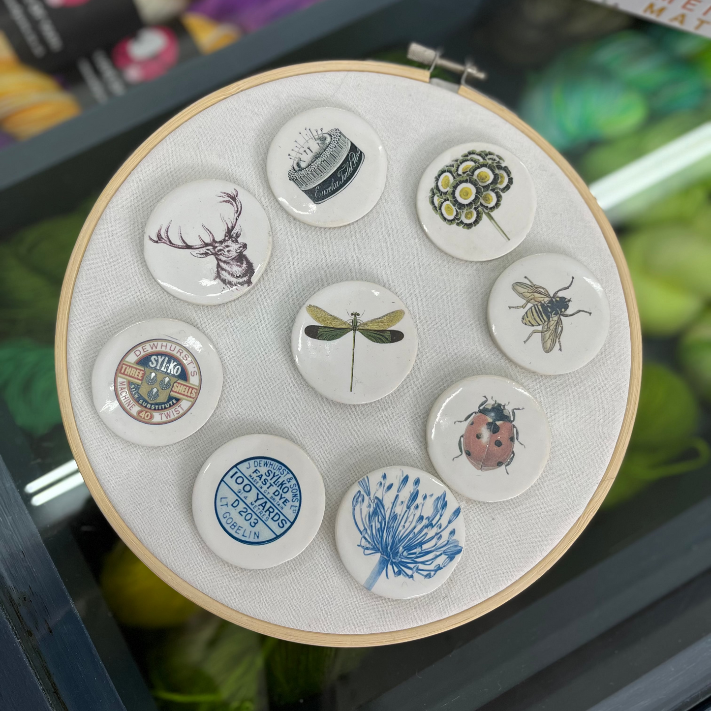 Embroidery Hoop display of the various nature themed needle minders.
