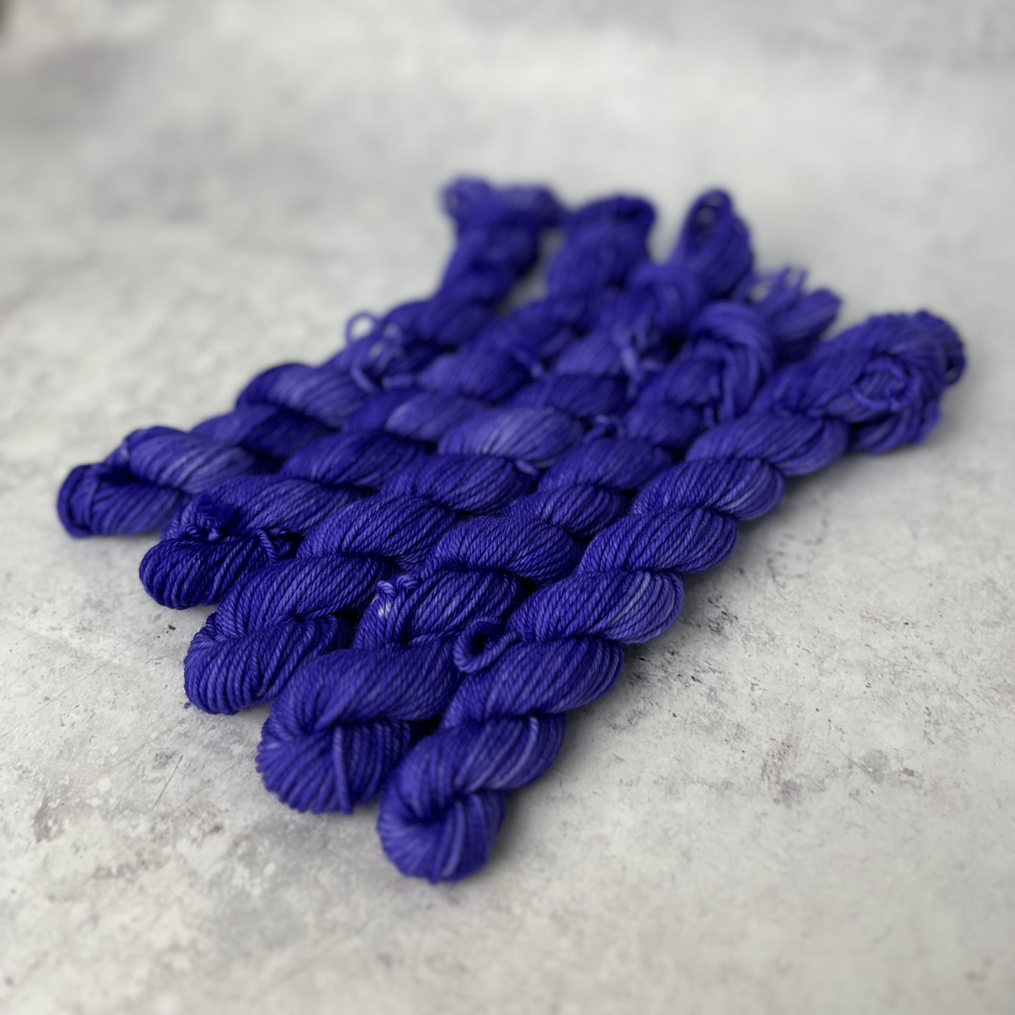 Purple Merino Nylon Mini Skein shown against a neutral background.