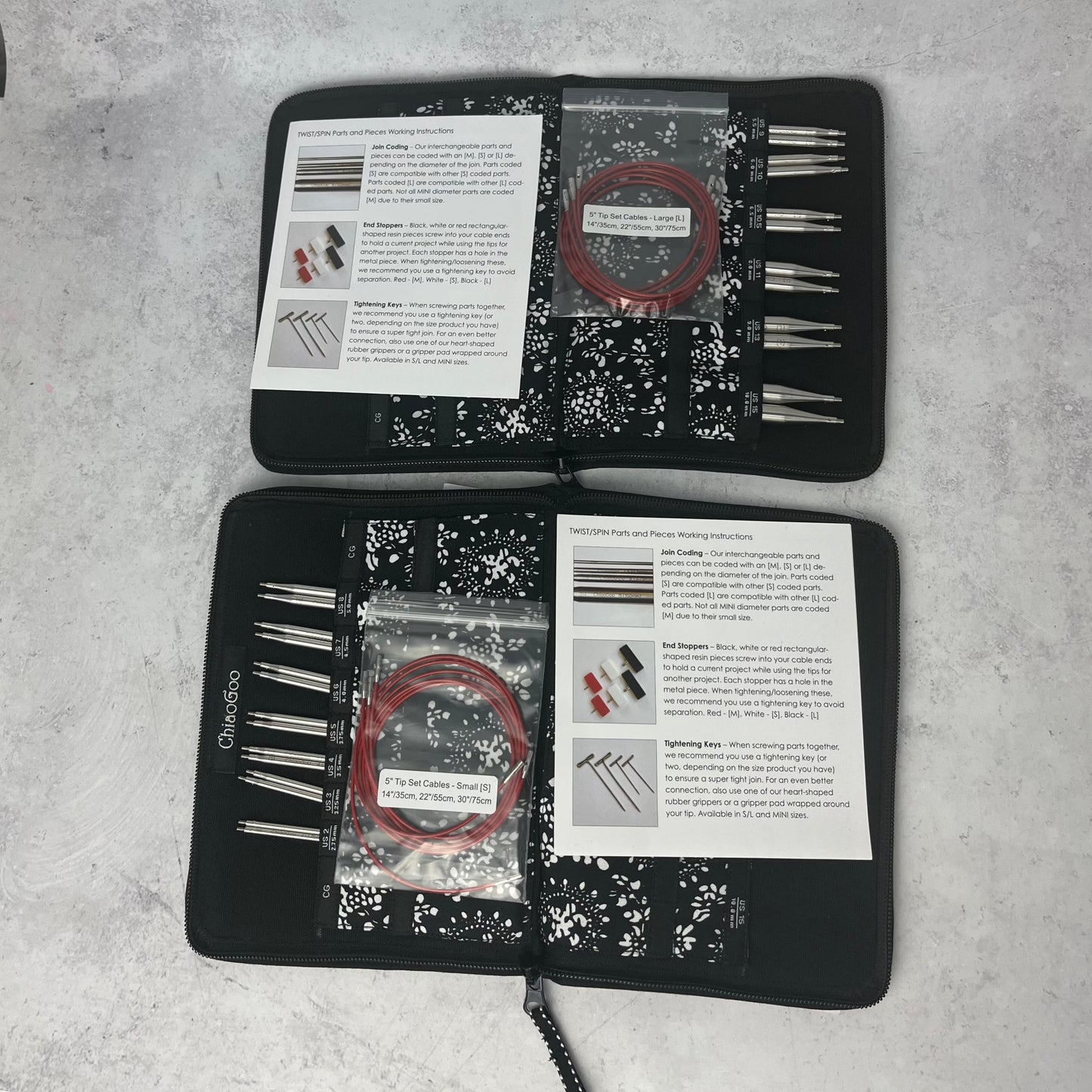 Two open needle cases; the top is the "large" needle collection, and the bottom one is the "sma