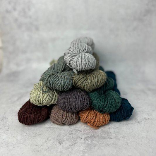 Each colour way of the range stacked in a pyramid, set against a neutral background.