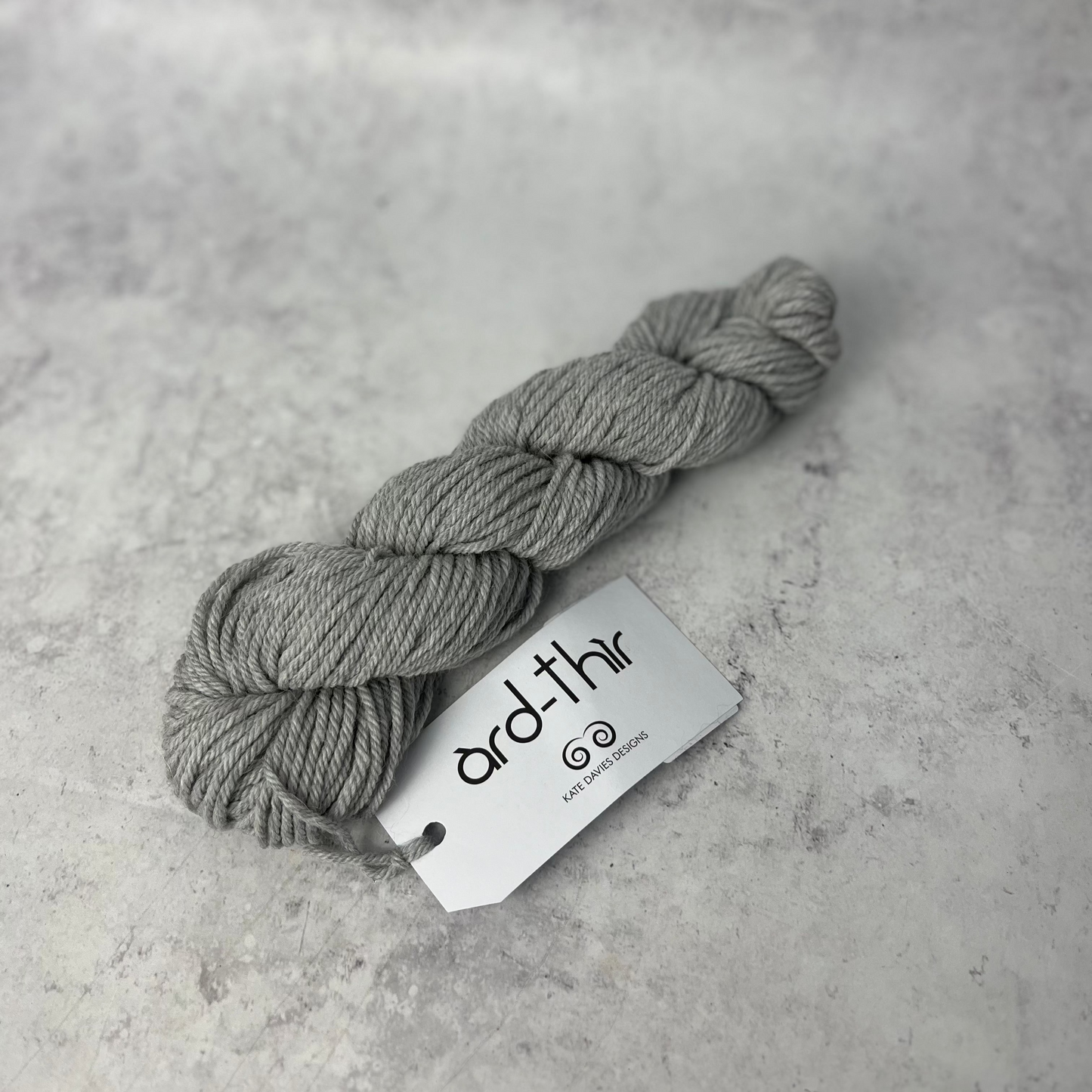 Skein of Camusdarach with label showing, set against a neutral background.
