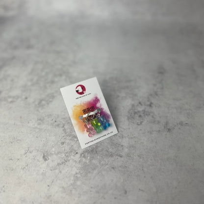 Set of "gummy bear" progress keepers with ring style attachment, shown on a backing card.