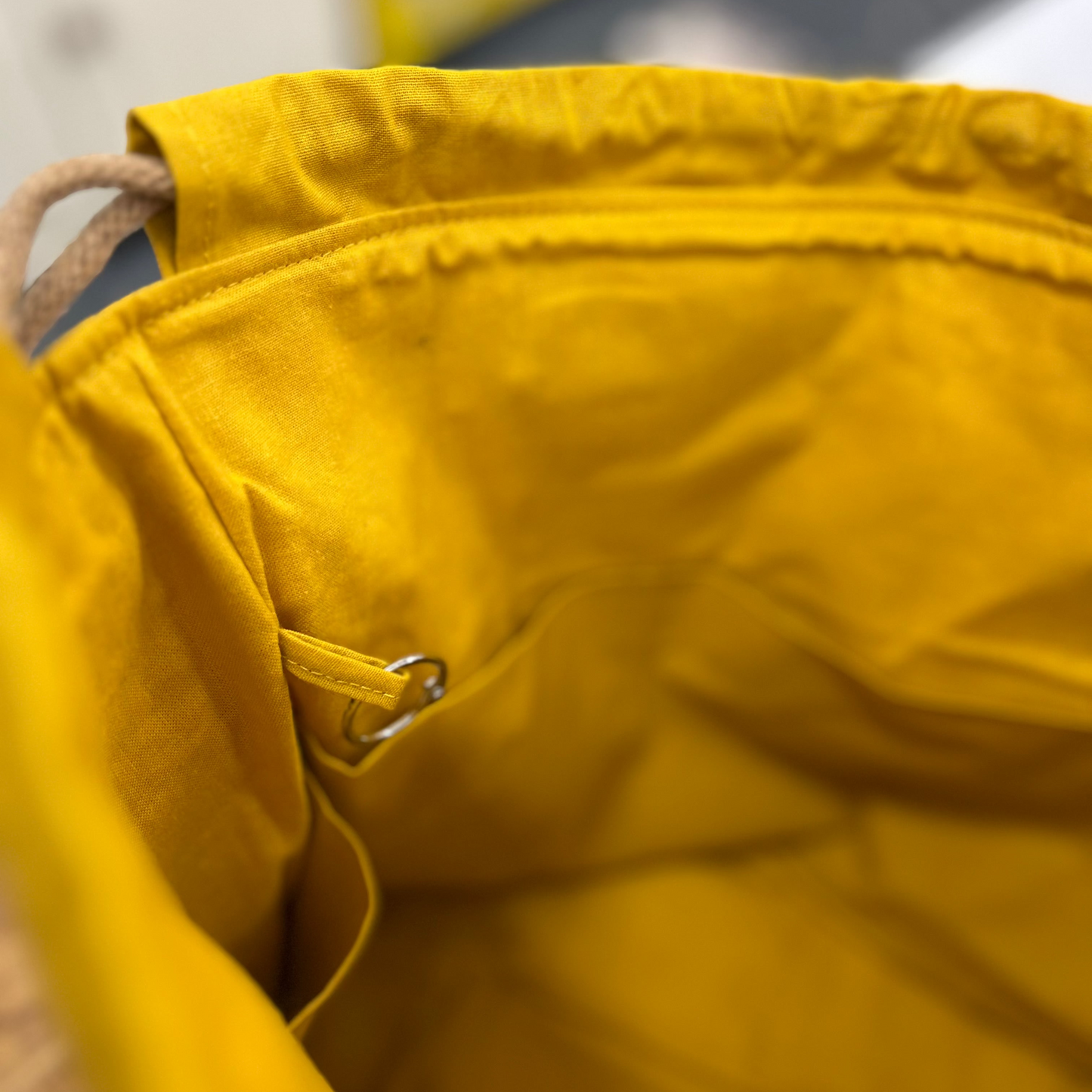 Clasp ring detail on the inner lining.