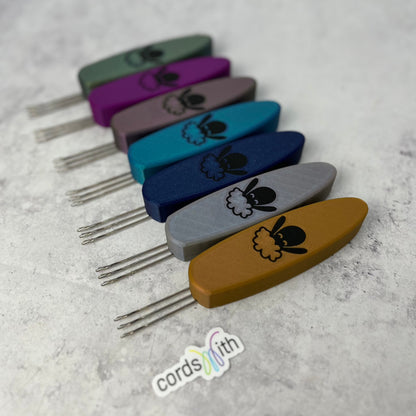 A row of Cordsmith Mini tools showing all of the colours availble.