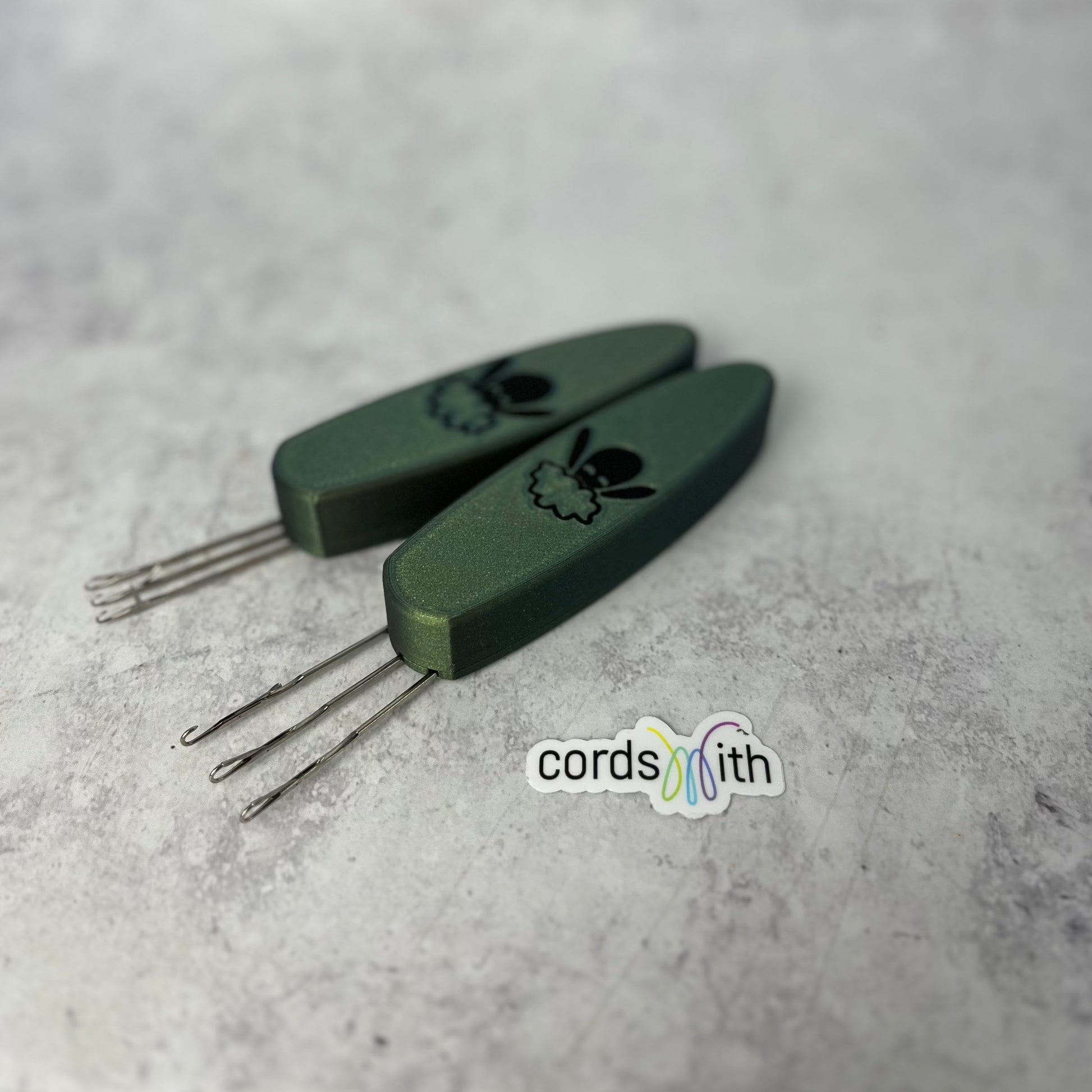 Cordsmith Tool in Green, Mini size on the left, Original on the right.