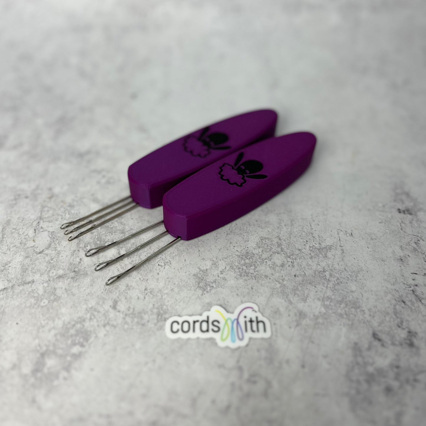 Cordsmith Purple Tool, Mini Size on the left and original on the right.