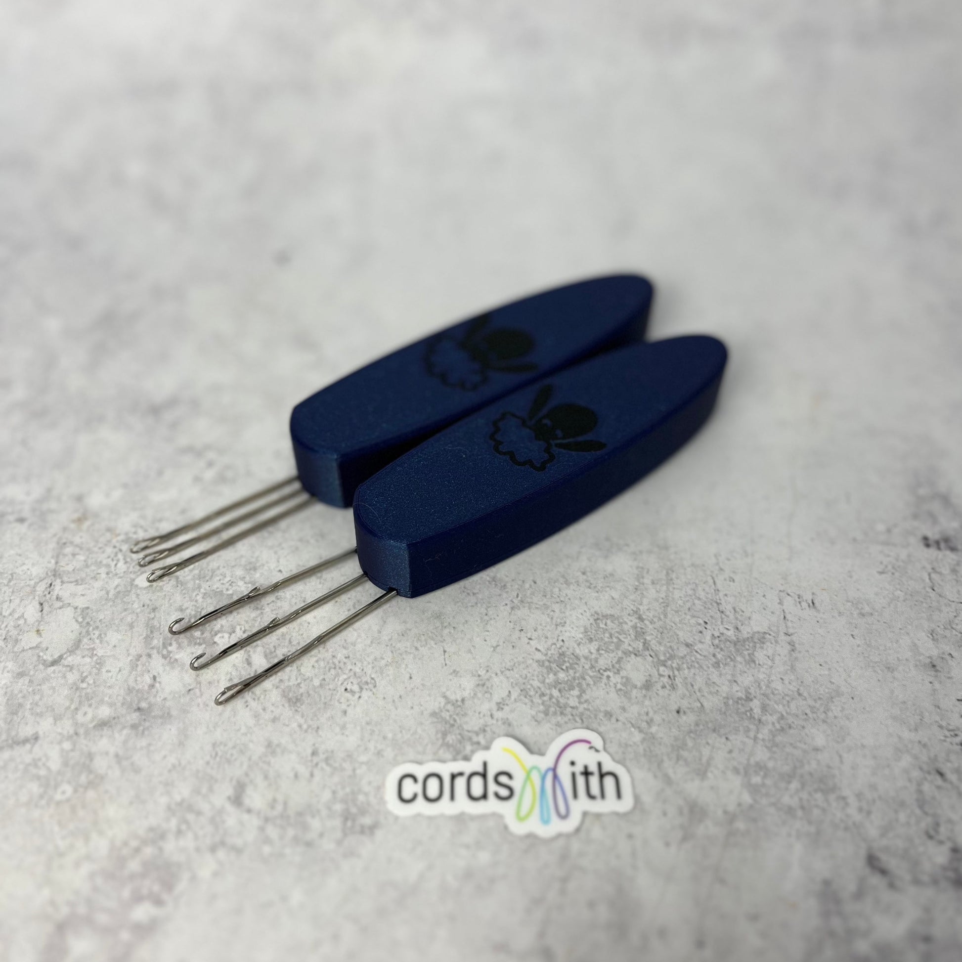Cordsmith Dark Blue tool, with mini on the left and original on the right.