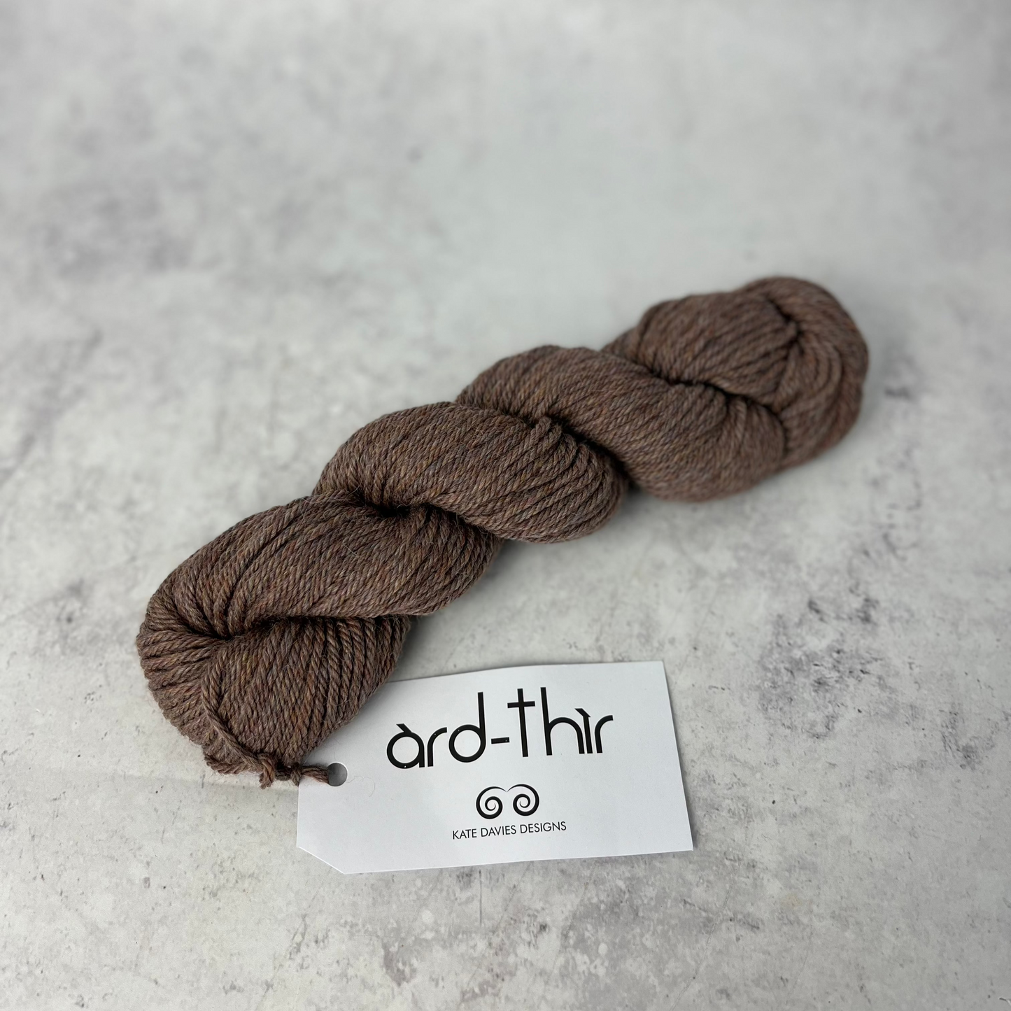Skein of Kintra with label showing, set against a neutral background.