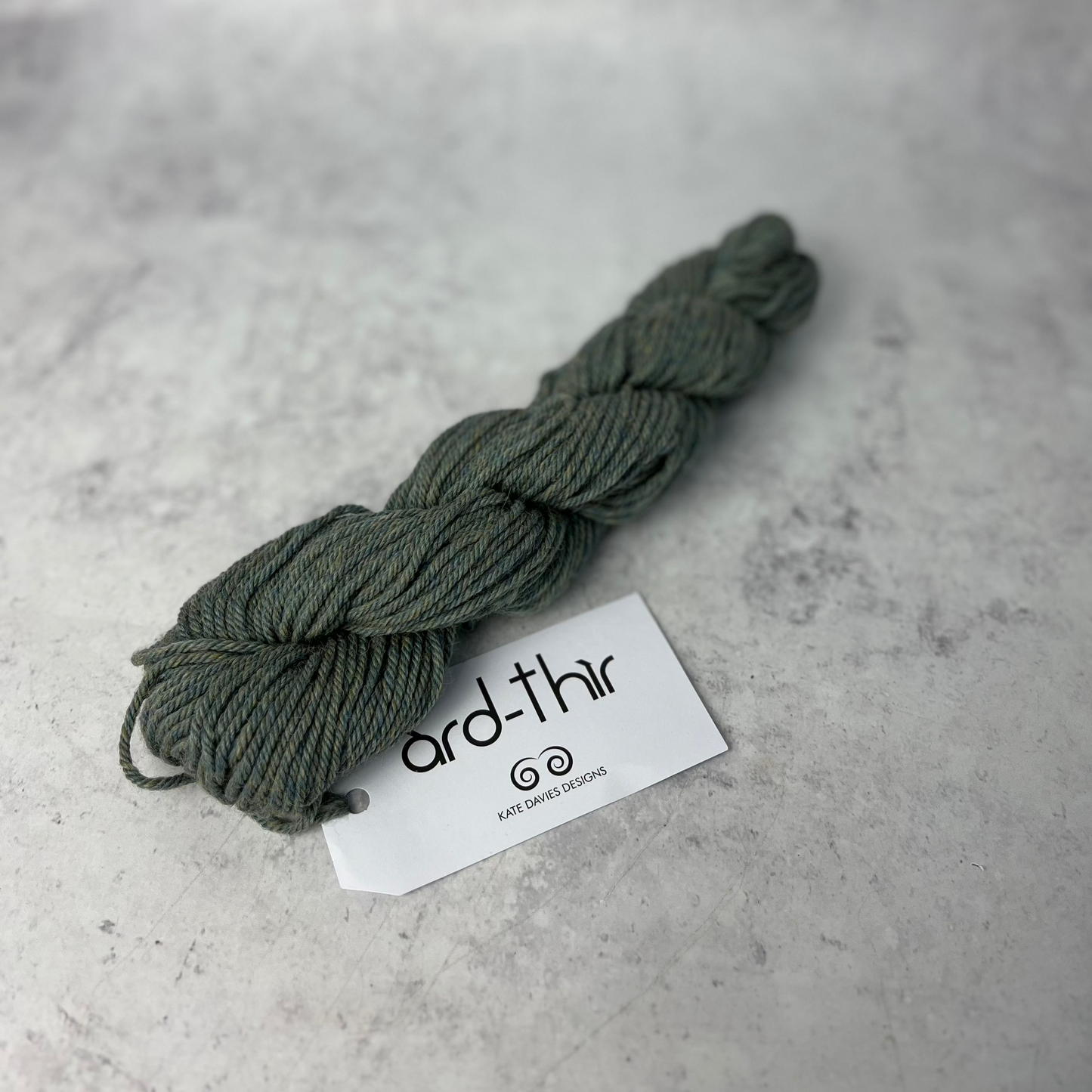 Skein of Vatersay with label showing, set against a neutral background.